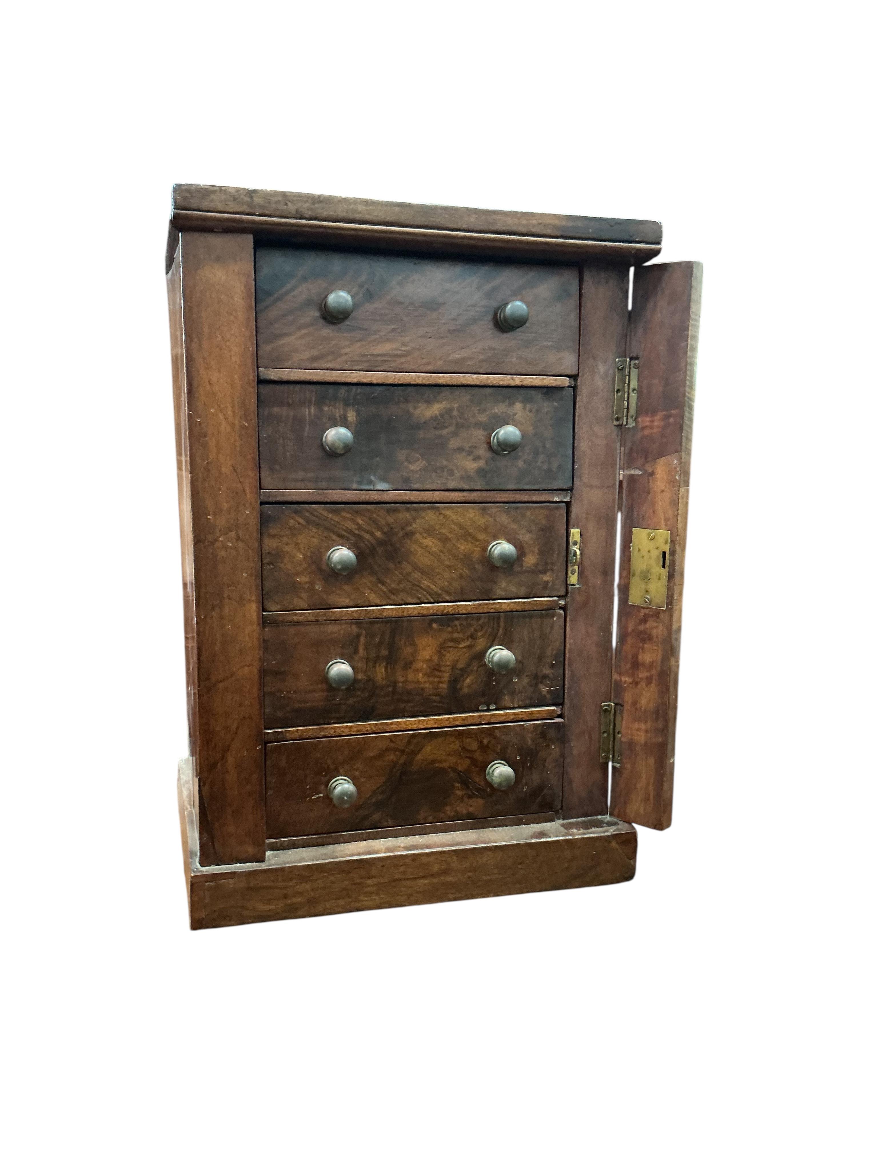 A Victorian walnut miniature wellington chest, width 35cm, depth 27cm, height 52cm
